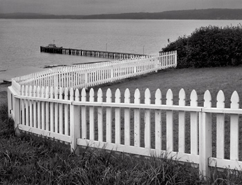 Fence and Pier, 1976. Port Townsend, Washington