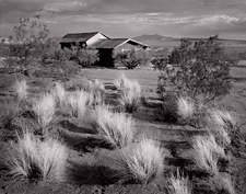 Sagebrush and Shack, Red Mountain, California. Limited edition black and white photograph